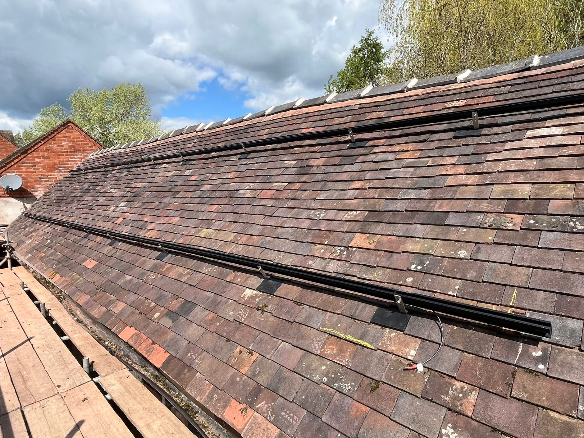 Solar panel installation barn rails — Makse Electrical & Renewables project photo