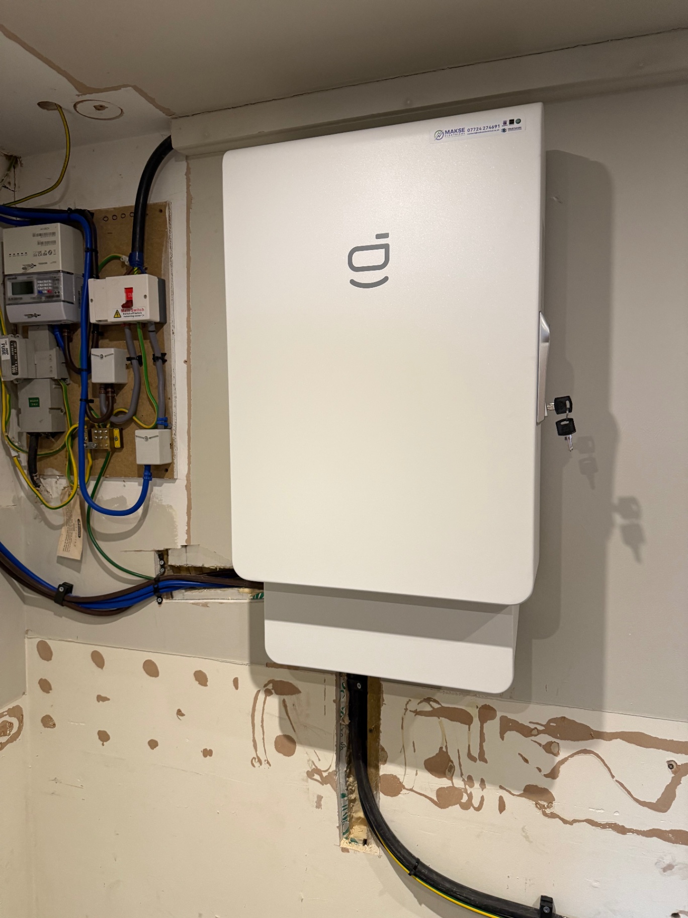 Sigenergy home battery storage and hybrid inverter installed indoors